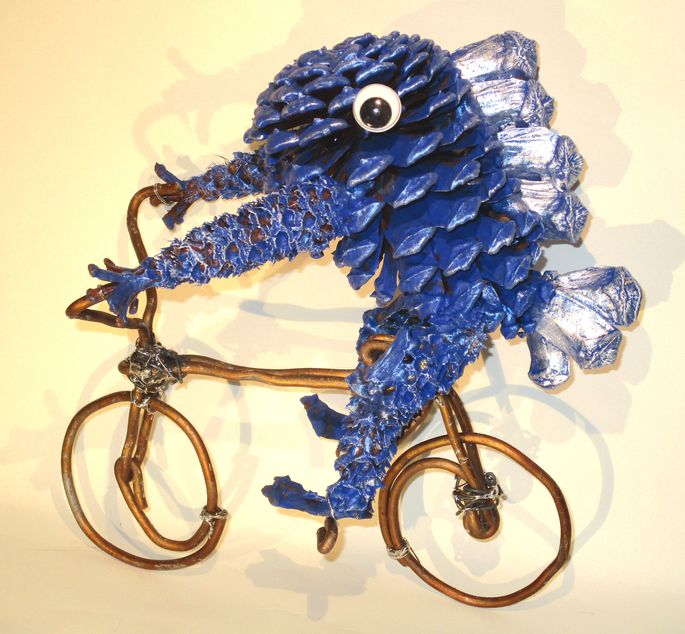 自転車に乗るさかなクン。